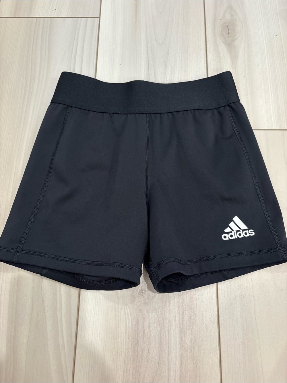 adidas Black Women's Athletic Shorts with White Logo Accent - Picture 1 of 4